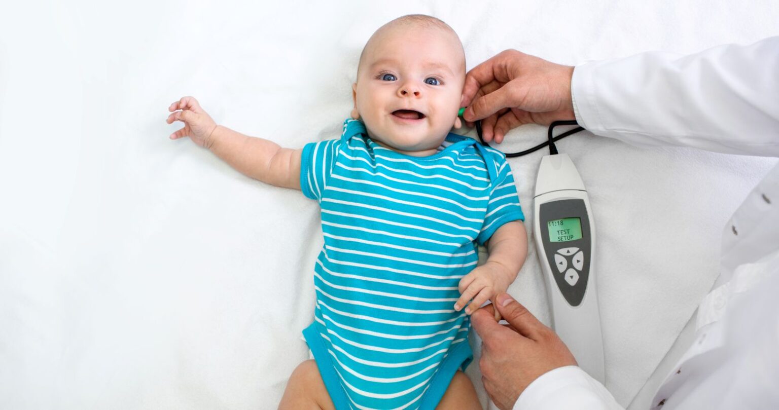 Pediatric Hearing Screening baby being screened for hearing loss